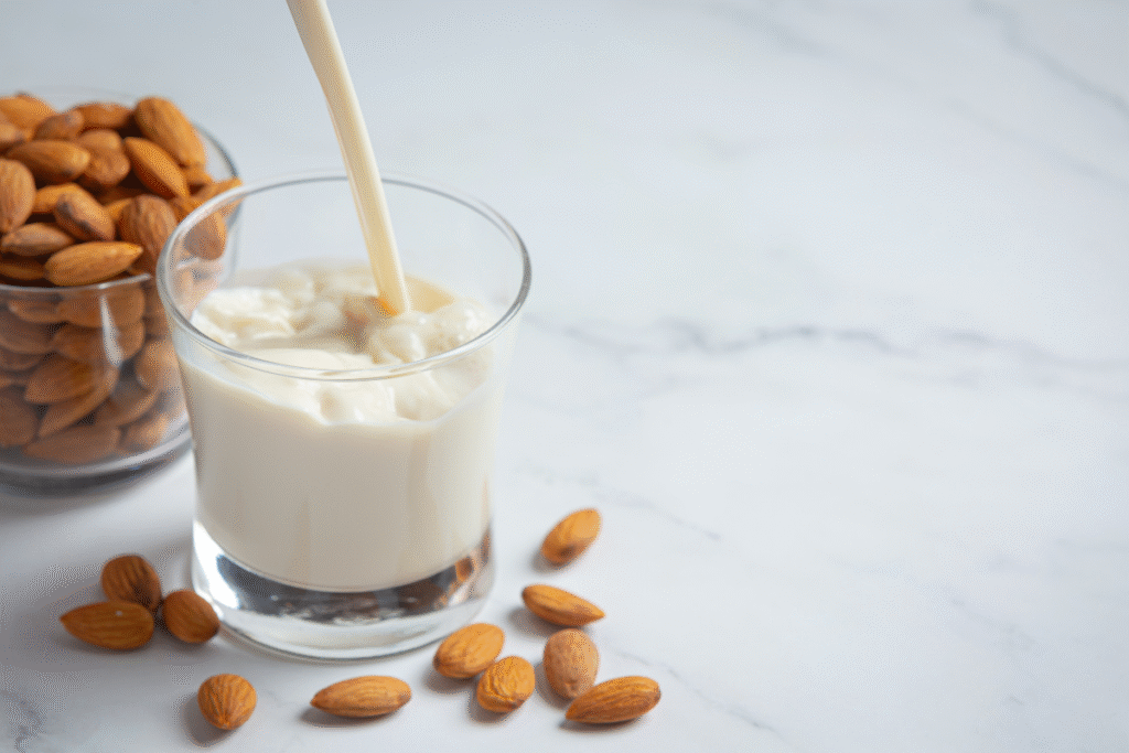 orang yang menuang susu almond
