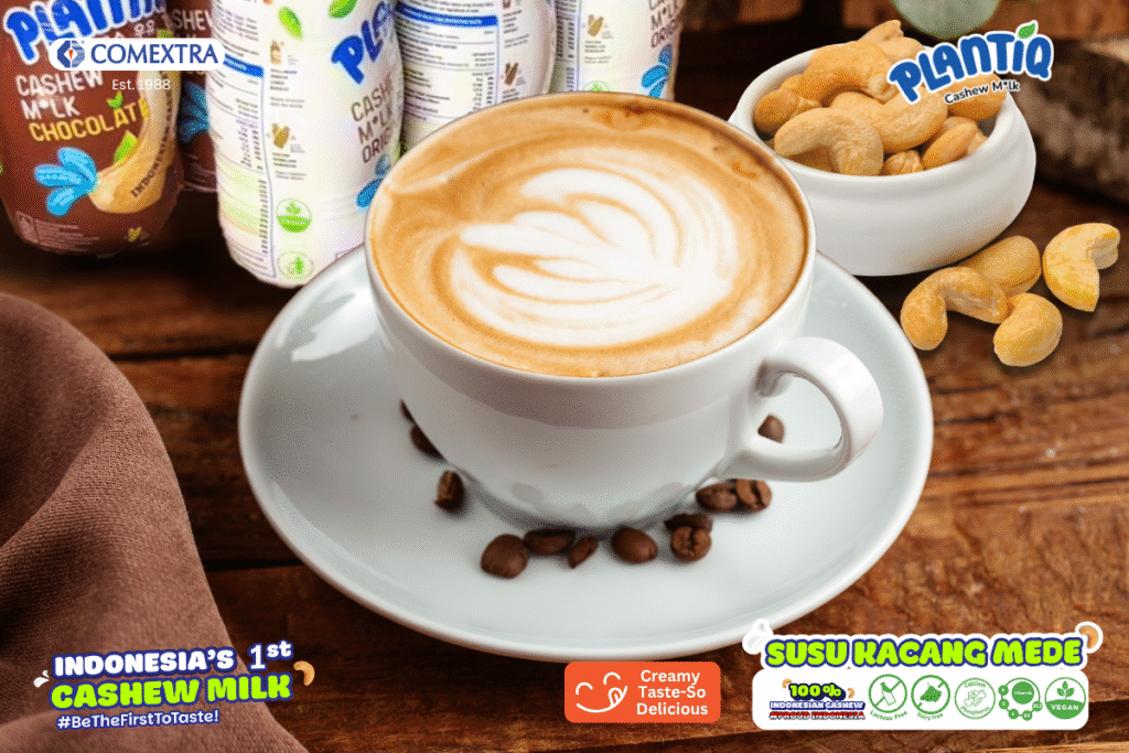 segelas kopi susu di meja