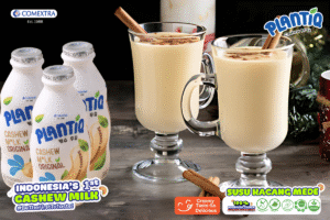 Tampak atas segelas kopi dan plantiq cashew milk